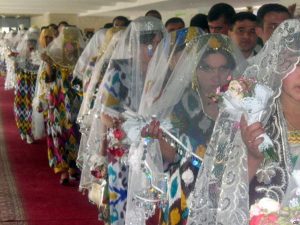 A mass wedding conducted during BBQ Bob's buy 4 get the 5th free ceremony clearance